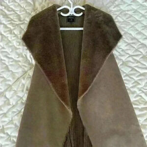 Woman’s fur coat  jacket in dark brown